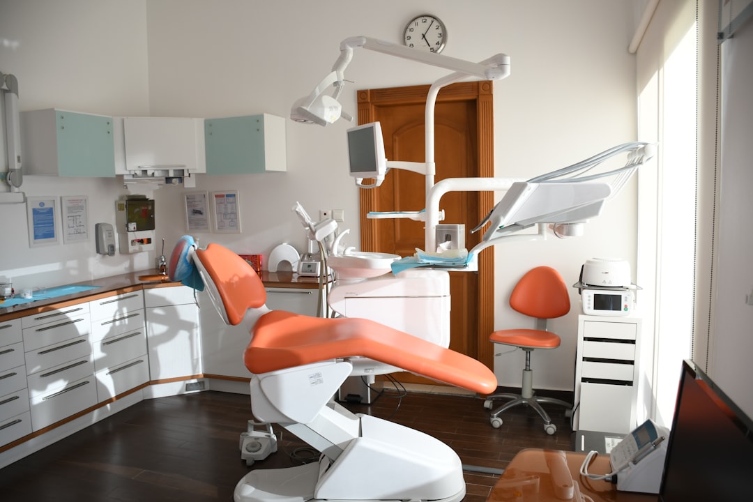 Dentist examining patient