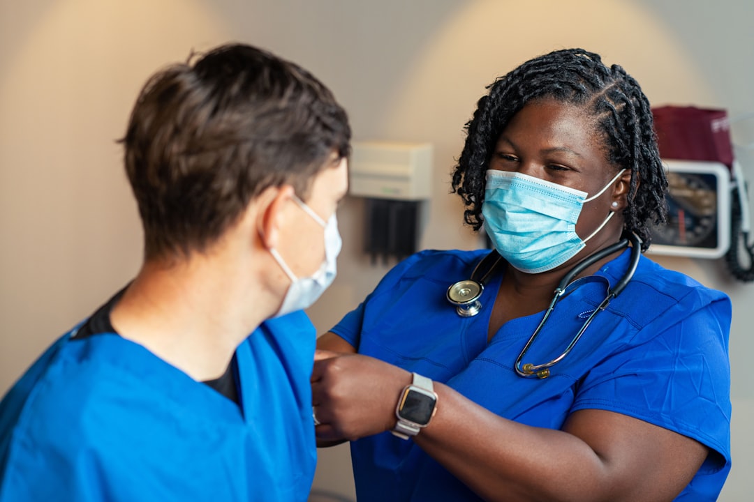 Nurse practitioner with patient