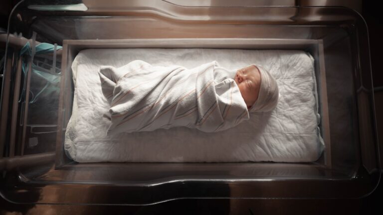 Newborn baby at the hospital, representing delivery arrangements with local hospitals